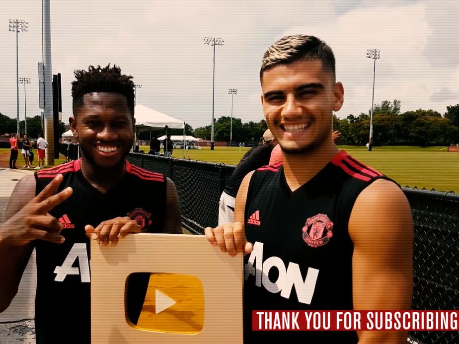 Fred and Andreas Pereira with the YouTube gold button.