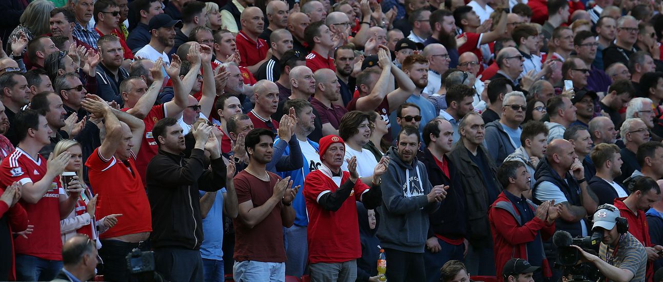United fans at Old Trafford. United fans at Old Trafford.