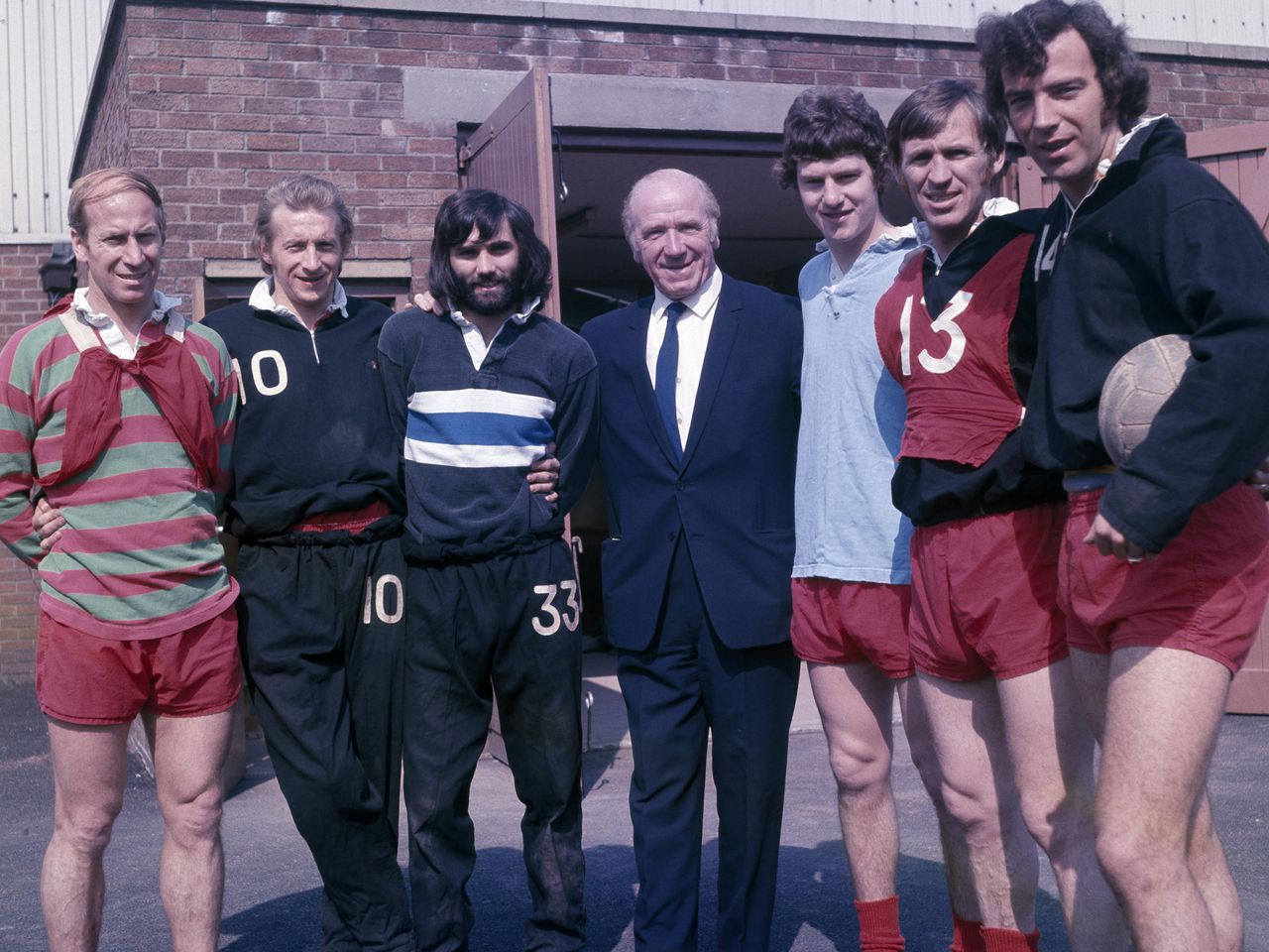 Sir Matt Busby with Manchester United players.