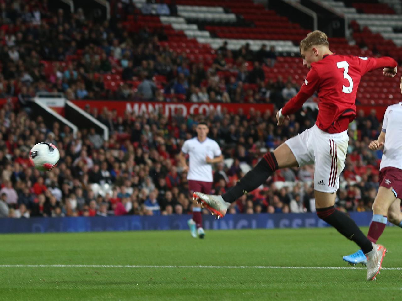 Brandon Williams fires in a shot against West Ham Under-23s at Old Trafford.