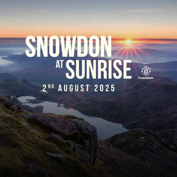Treble-winner May joins Snowdon trek