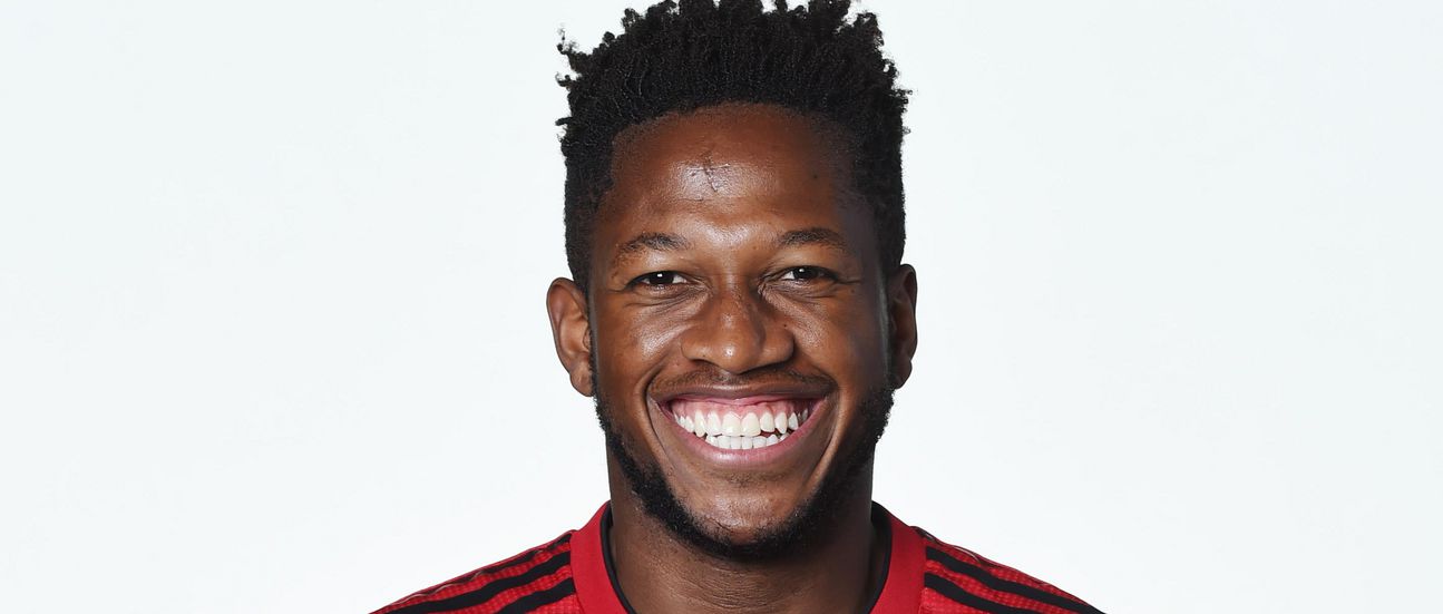 Fred poses in United's home shirt for 2018/19