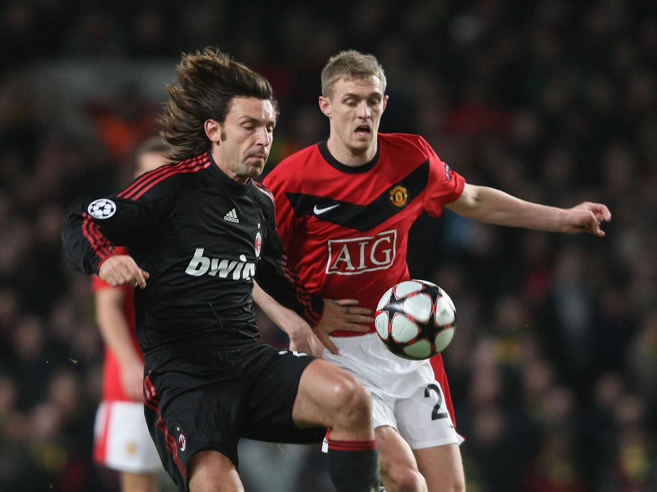 Andrea Pirlo battles with Darren Fletcher when Man Utd last played Milan at Old Trafford in 2010