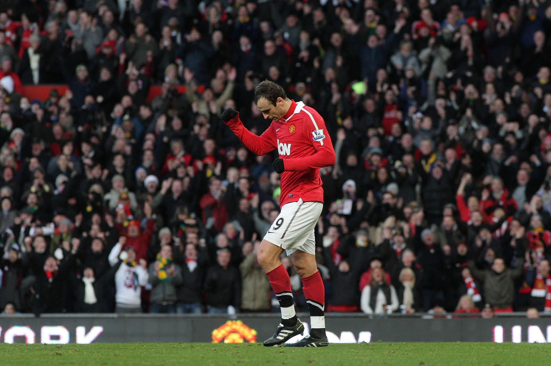 Dimitar Berbatov celebrates a goal against Blackburn Rovers at Old Trafford. 