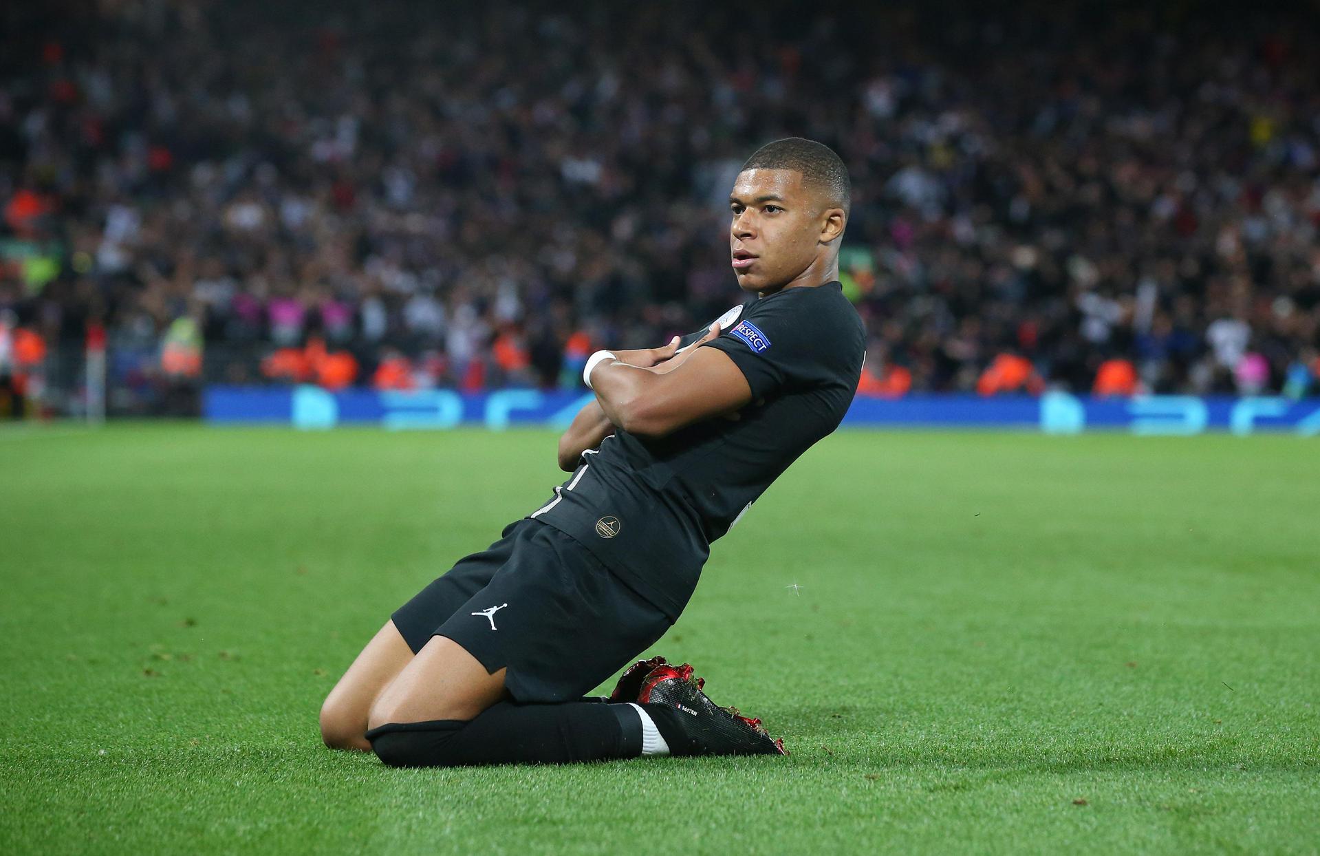 Kylian Mbappe celebrates goal against Liverpool
