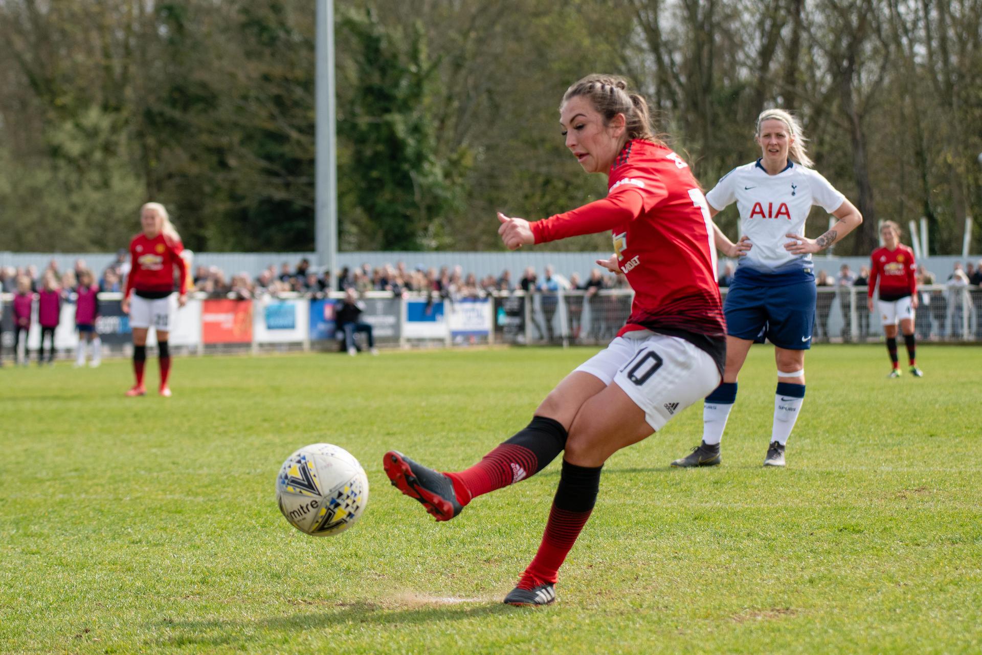 Katie Zelem scores a penalty against Spurs Ladies