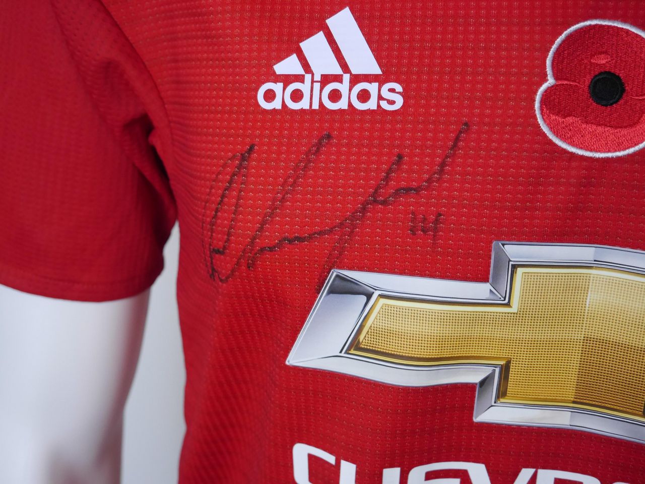Manchester united jersey poppy clearance