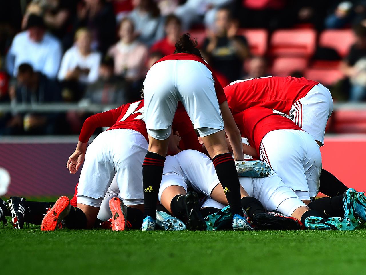 United celebrate Katie Zelem's goal.