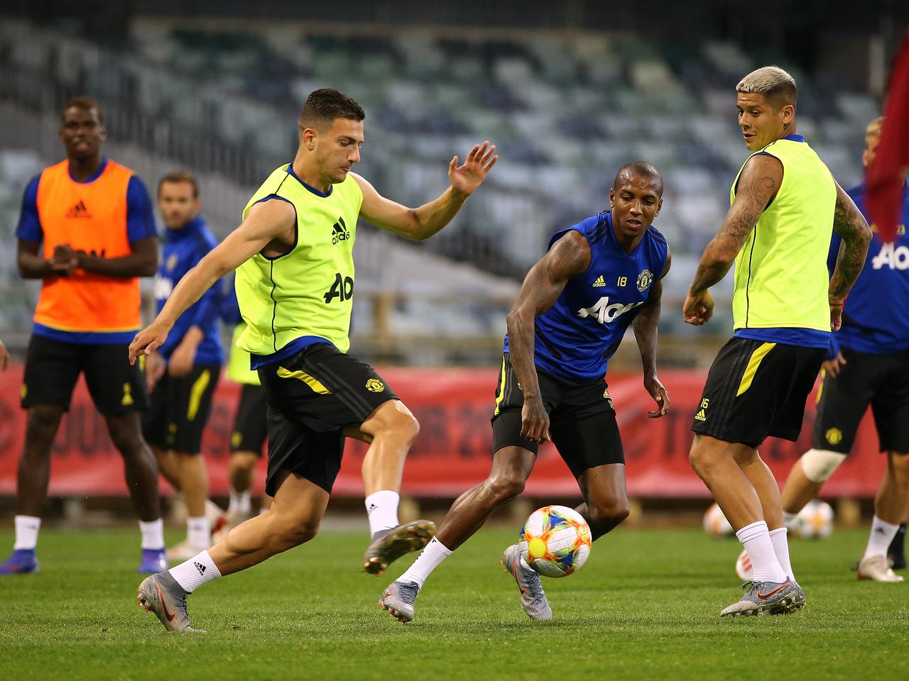 Diogo Dalot, Ashley Young and Andreas Pereira involved in pre-season training during the 2019 tour of Australia.，