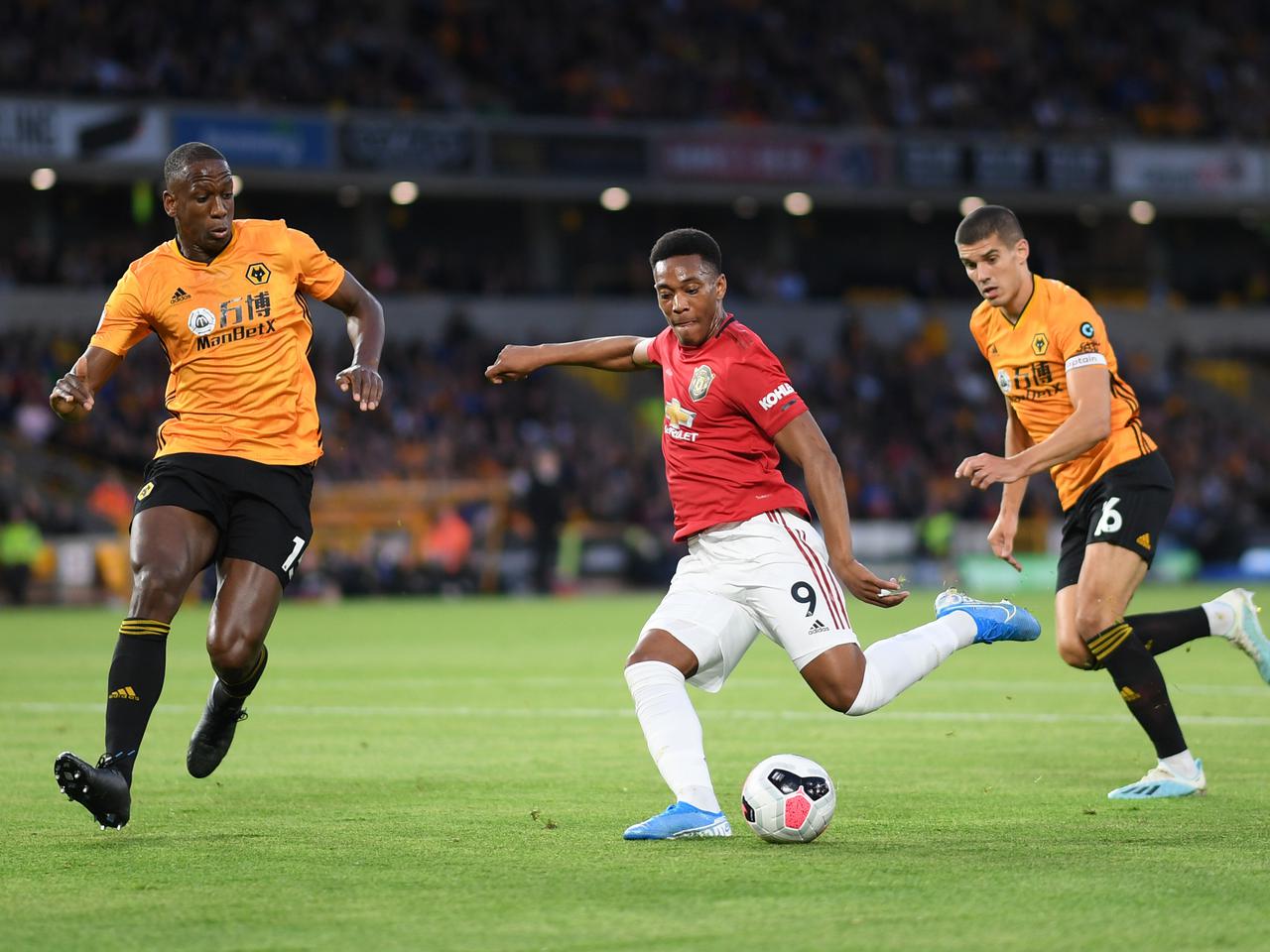 Anthony Martial strikes opening goal against Wolves.