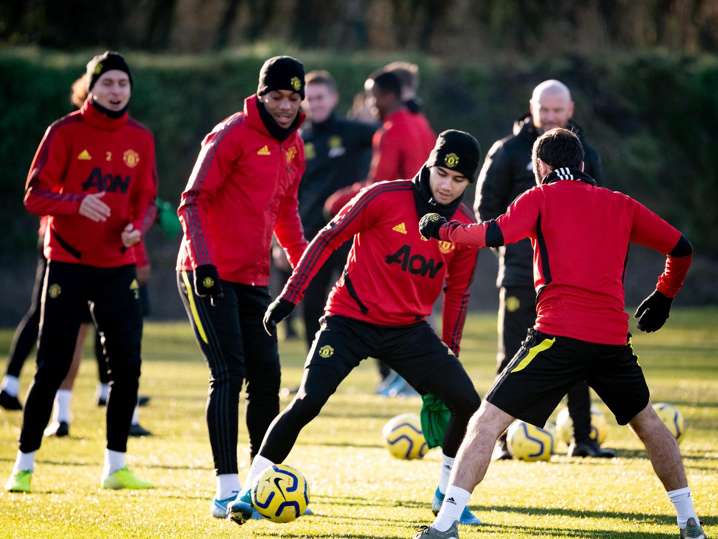 Victor Lindelof, Anthony Martial and Andreas Pereira at the Aon Training Complex