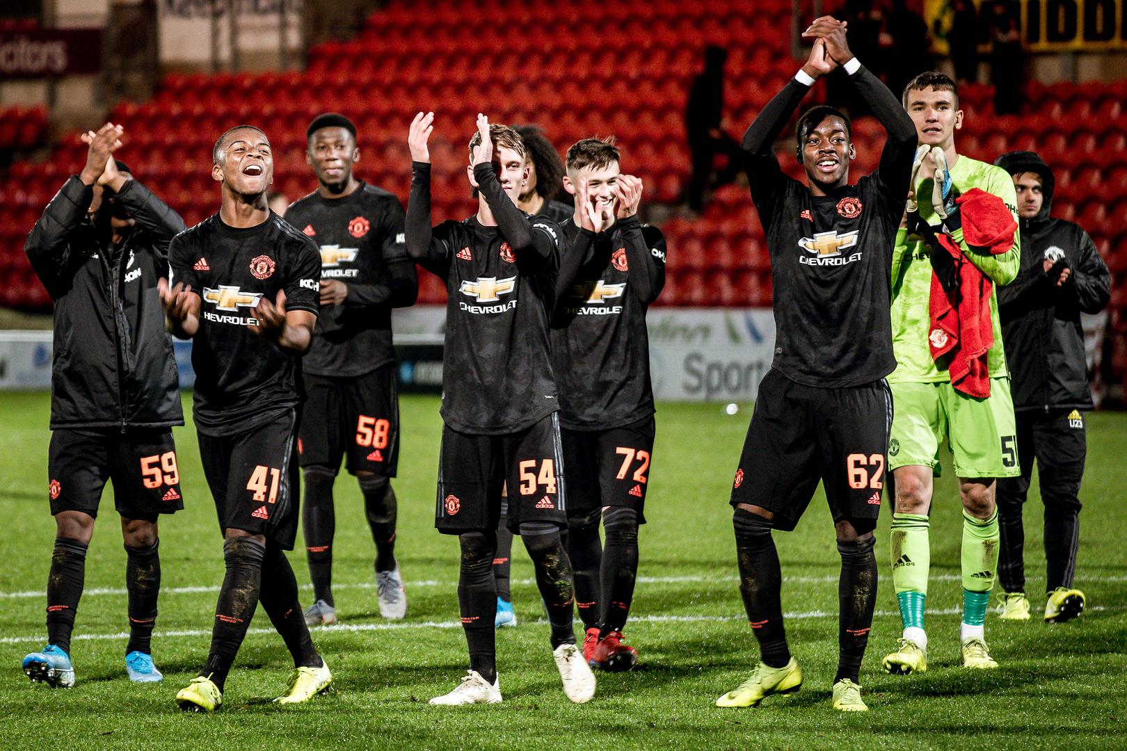 United's Under-23s celebrate a win at Doncaster.