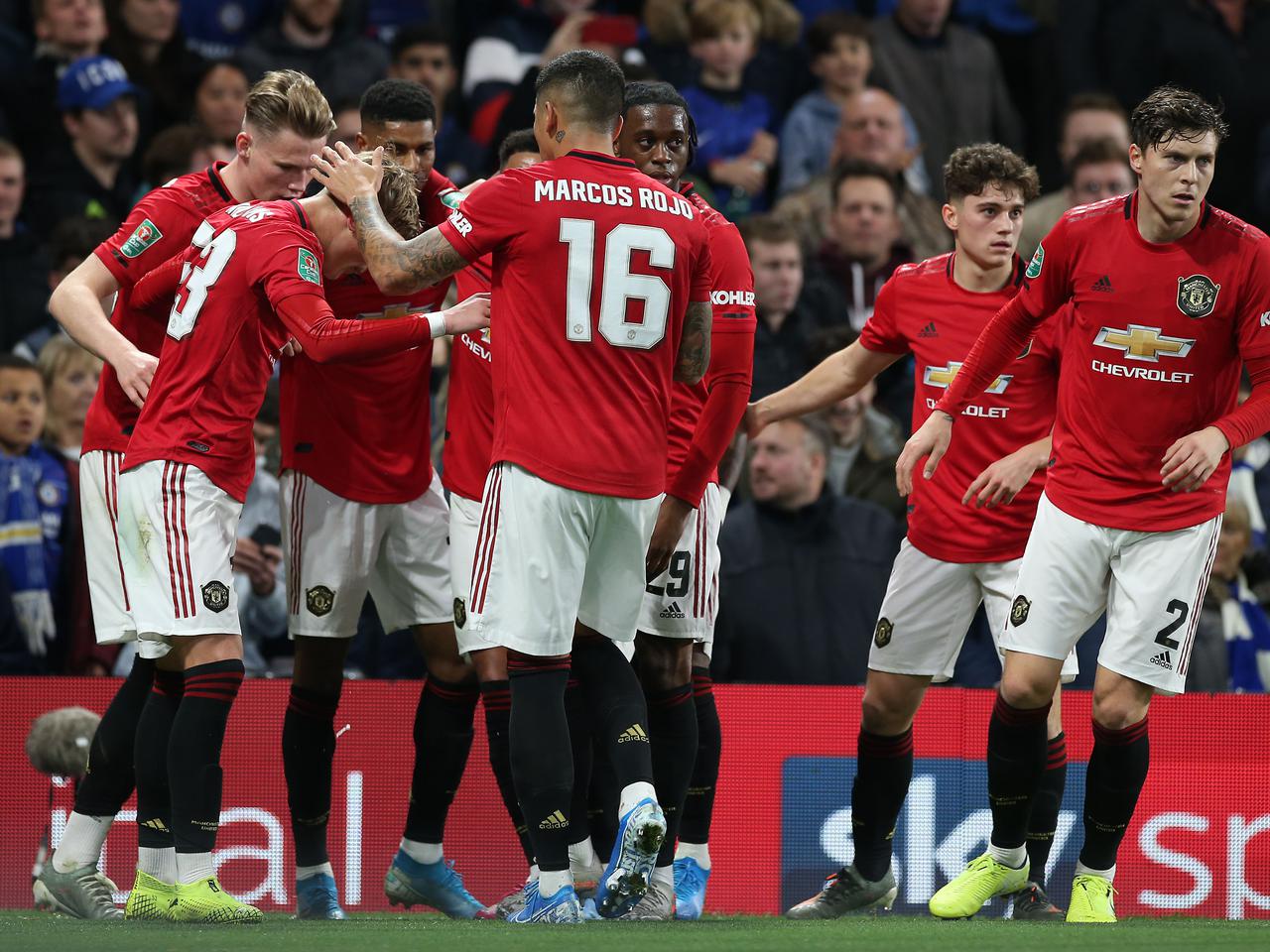 Manchester United players celebrate a Carabao Cup goal 