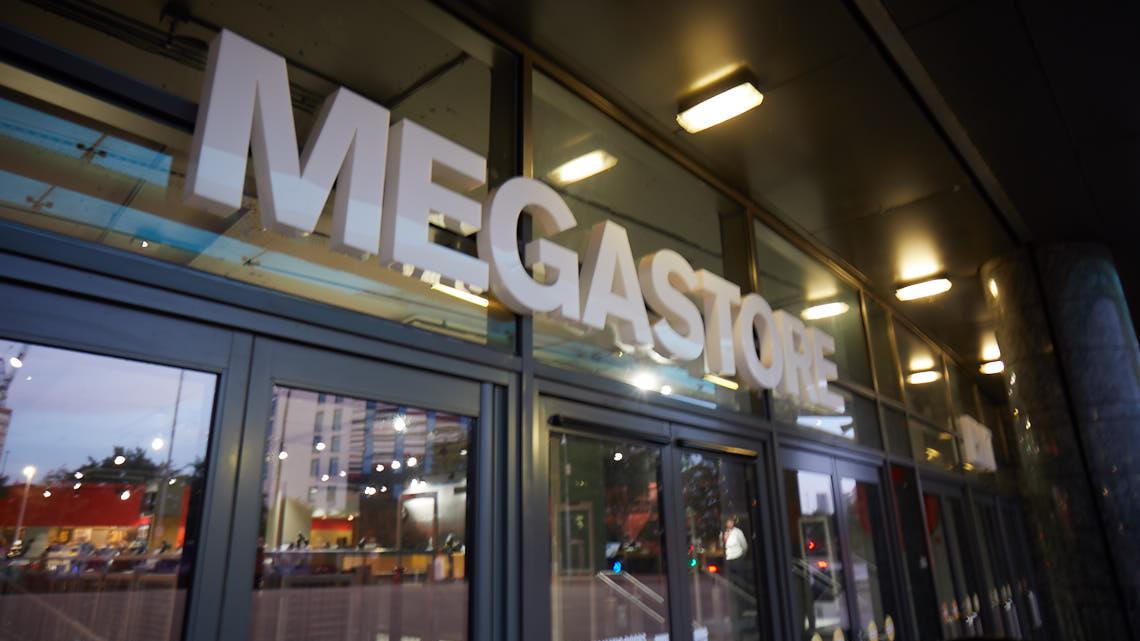 Customer advice signage for Old Trafford Megastore reopening