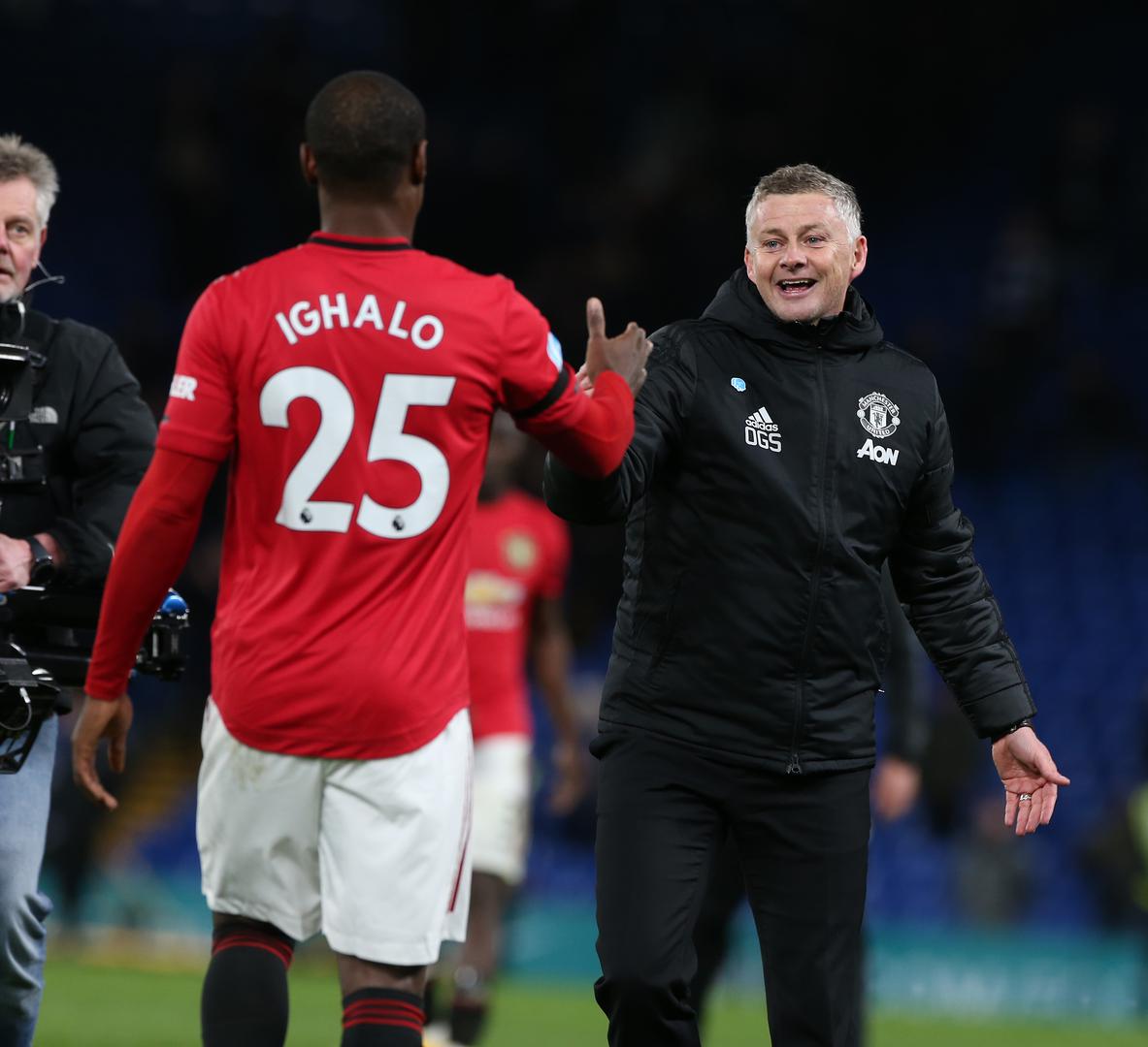 Odion Ighalo and Ole Gunnar Solskjaer celebrate United's win at Chelsea