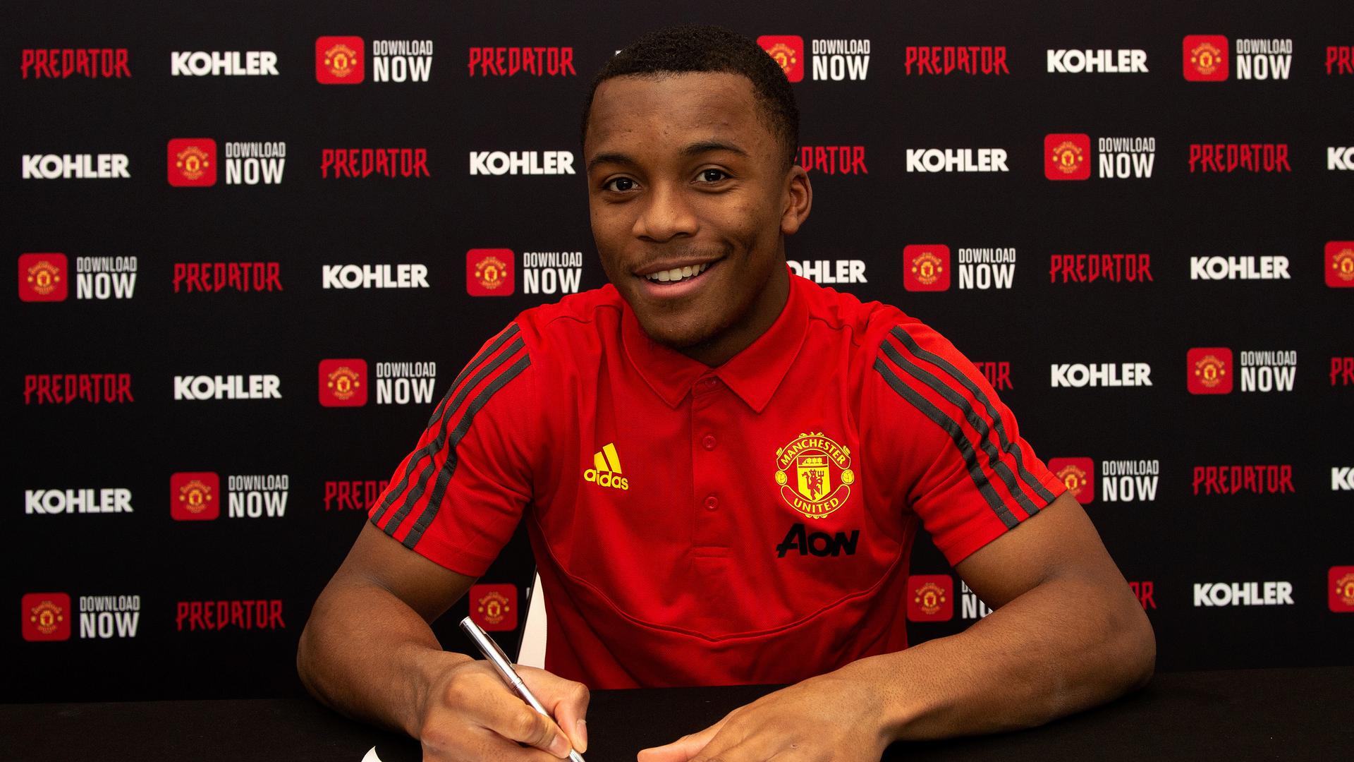 New Contracts For Ethan Laird And Paul Woolston Manchester United