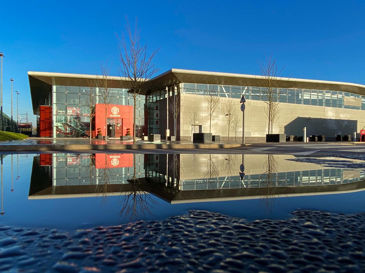 Outside of Aon Training Complex.