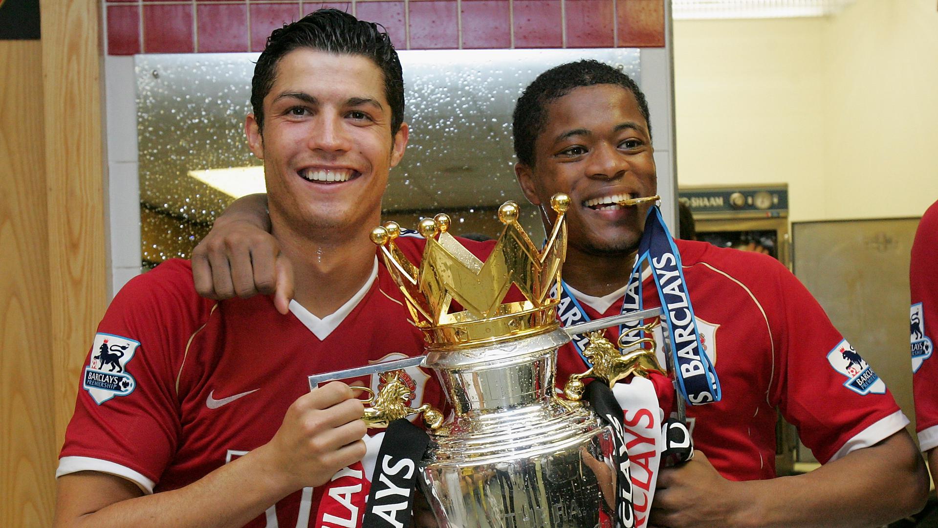 Cristiano Ronaldo and Patrice Evra with the Premier League trophy | SportzPoint