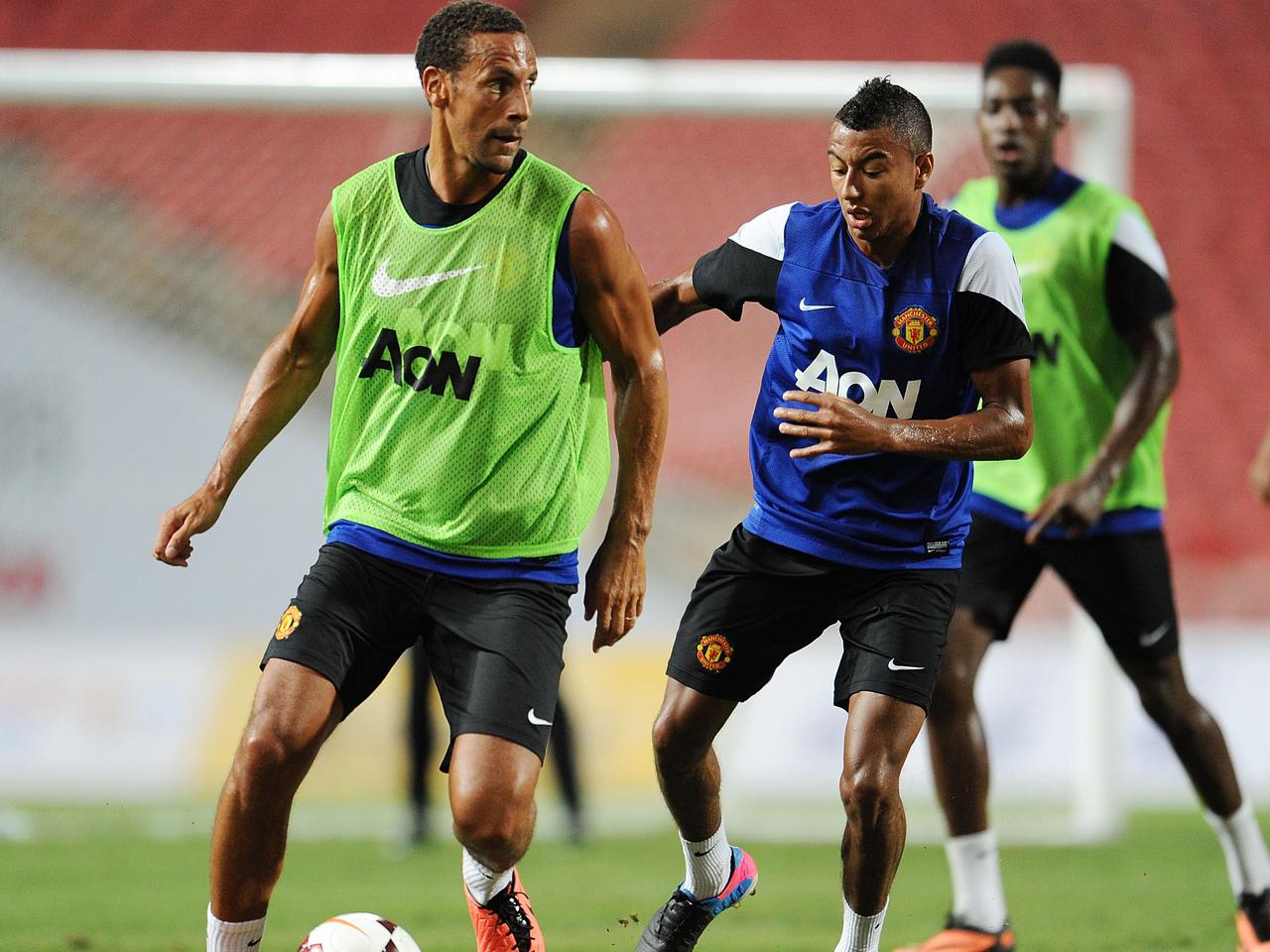 Rio Ferdinand and Jesse Lingard during Manchester United training in 2012.