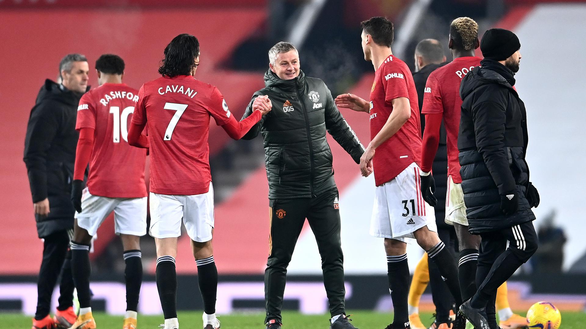 https://assets.manutd.com/AssetPicker/images/0/0/14/134/952001/solskjaer_mates1609285931040_large.jpg