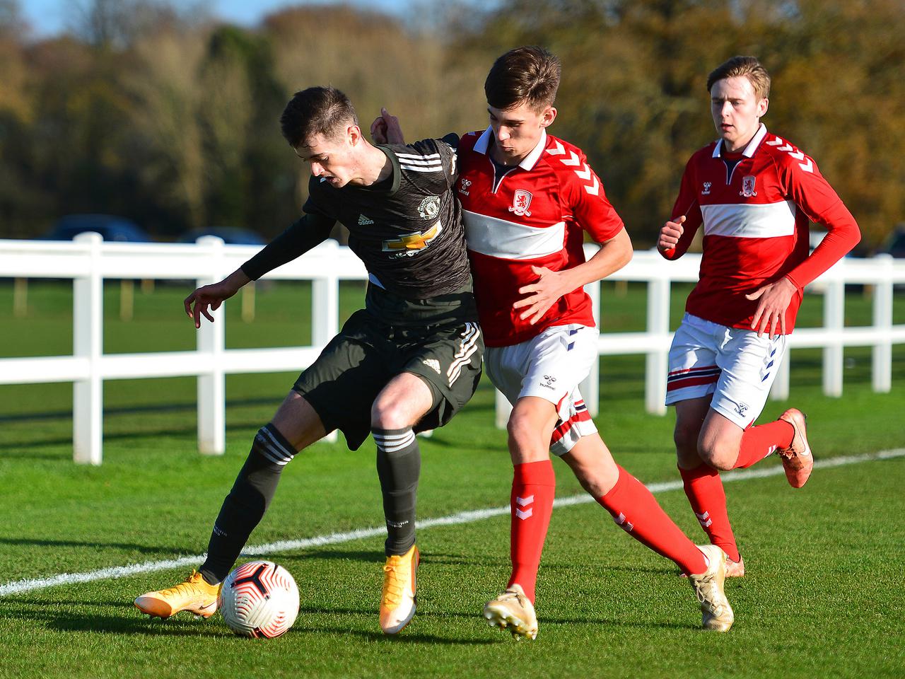 Joe Hugill holds the ball up.