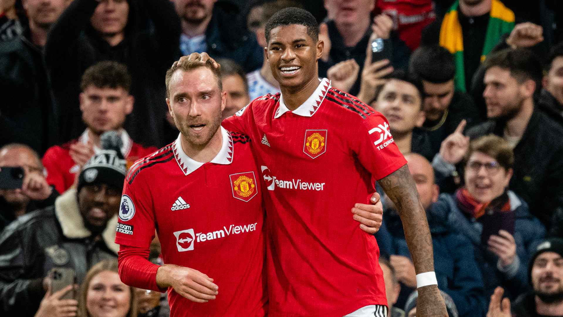 Christian Eriksen with Marcus Rashford.
