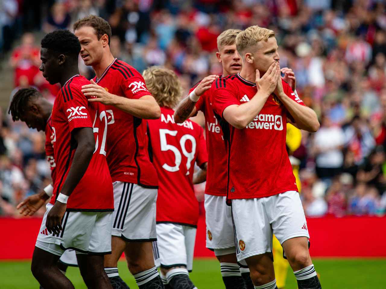 Donny van de Beek celebrates scoring for Man Utd against Lyon. 
