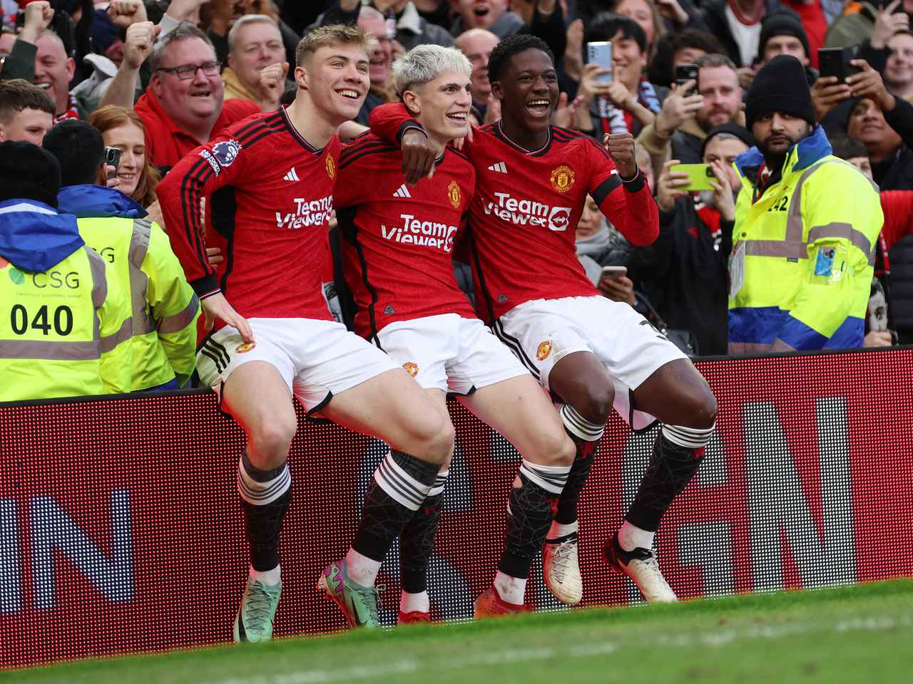 Hojlund, Garnacho, and Mainoo celebrating