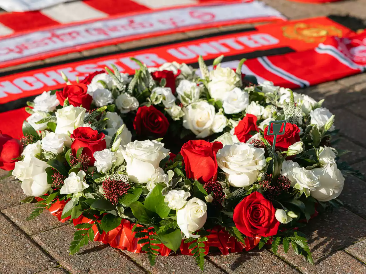 A wreath in tribute to Sir Bobby Charlton.