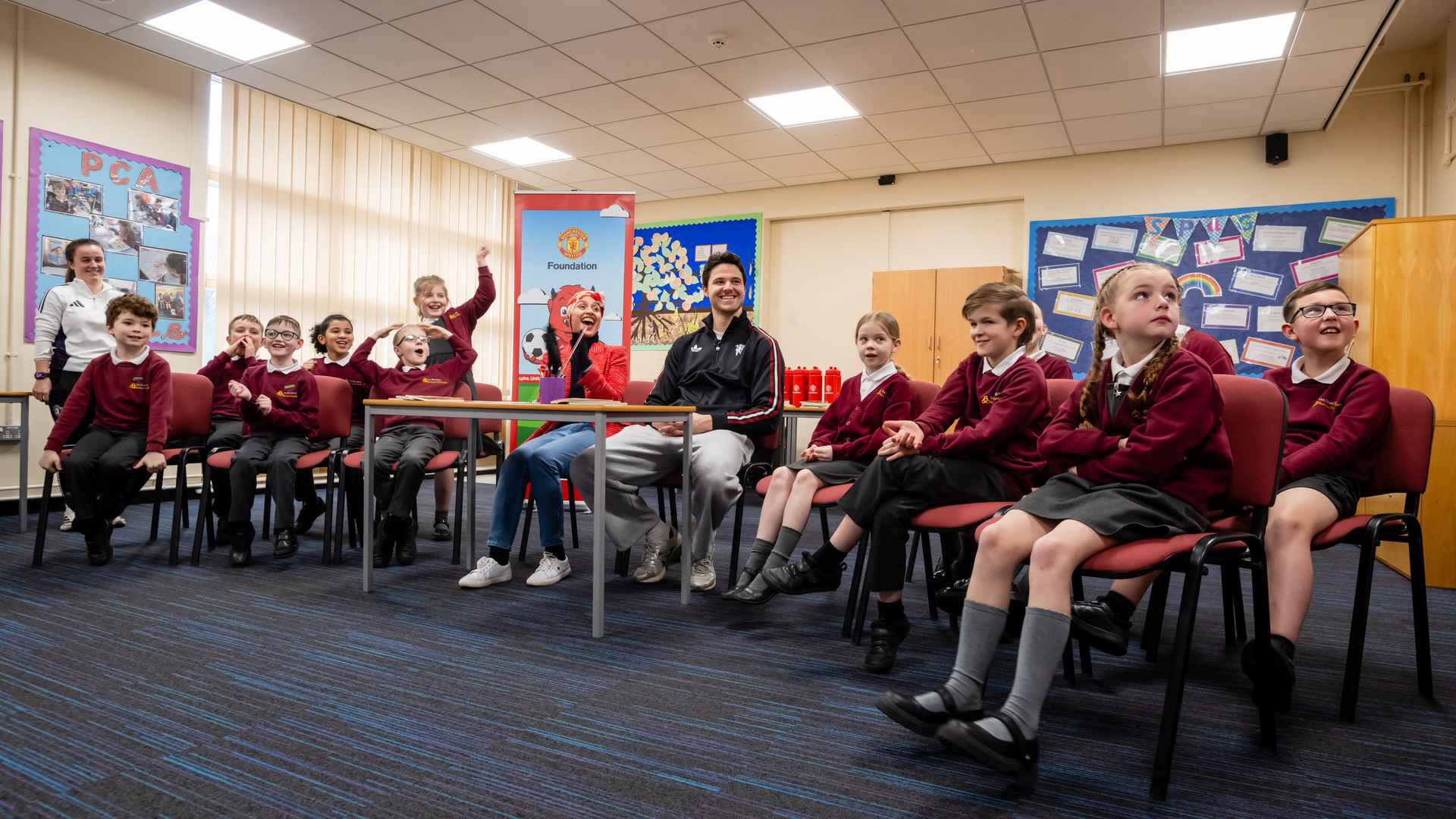 Senne Lammens celebrates World Book Day with Man Utd Foundation