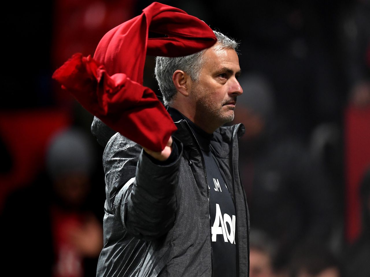 Jose Mourinho waving his red scarf at Old Trafford.