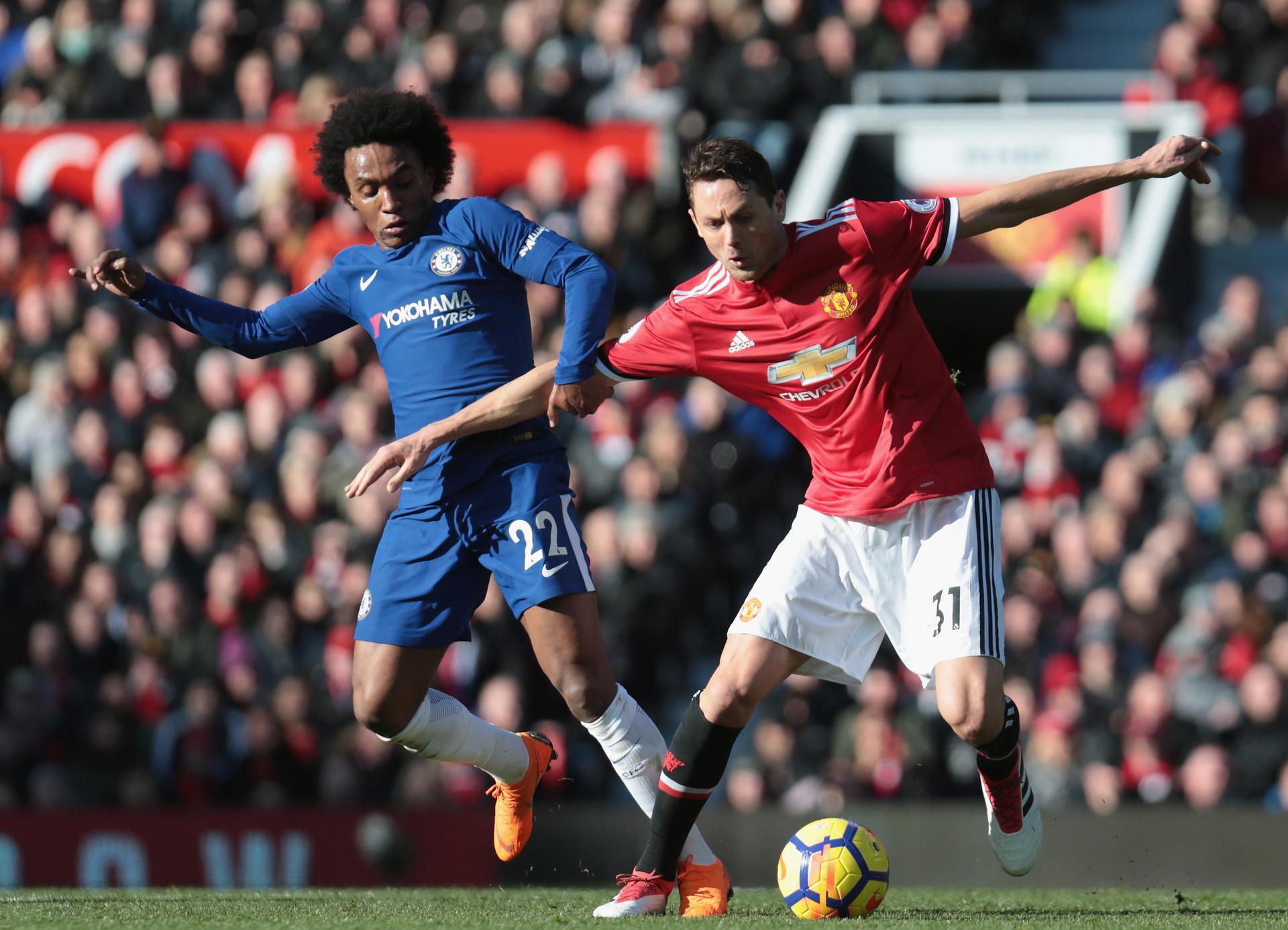 Nemanja Matic battles with Willian.